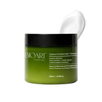 Green hair mask jar with black lid on a white background