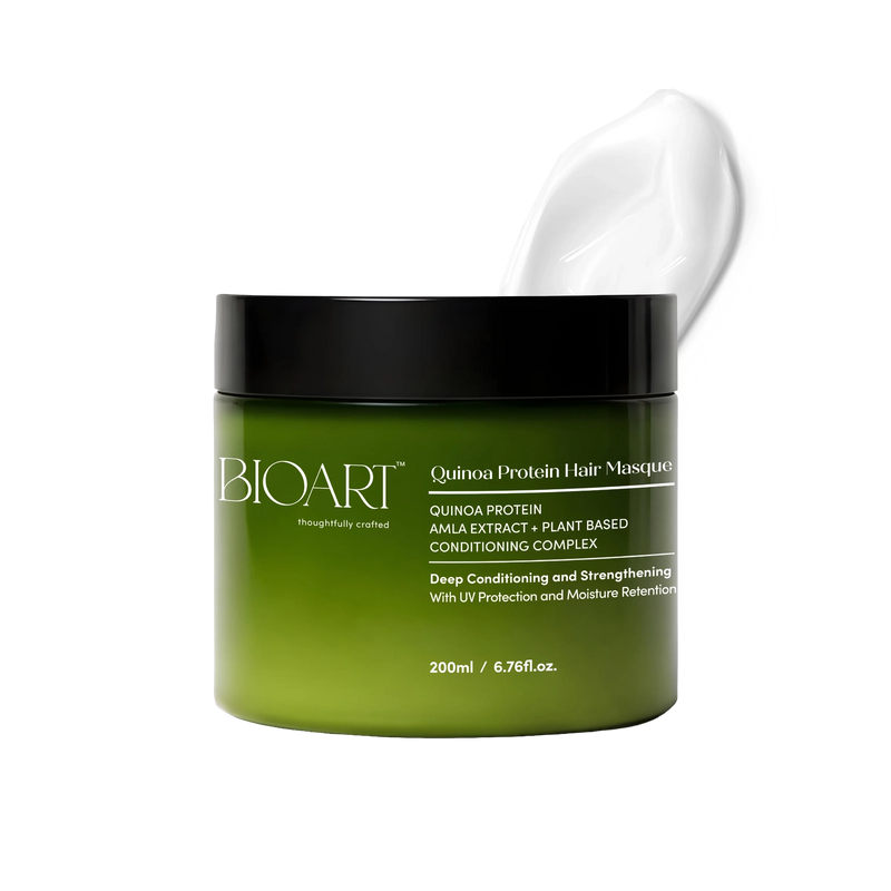 Green hair mask jar with black lid on a white background
