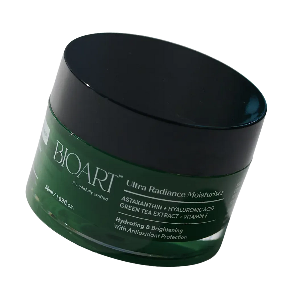Green jar of BIOART Ultra Radiance Moisturizer on a white background