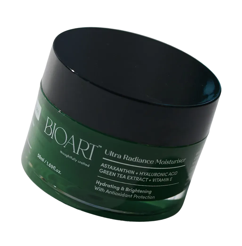 Green jar of BIOART Ultra Radiance Moisturizer on a white background
