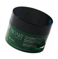 Green jar of BIOART Ultra Radiance Moisturizer on a white background