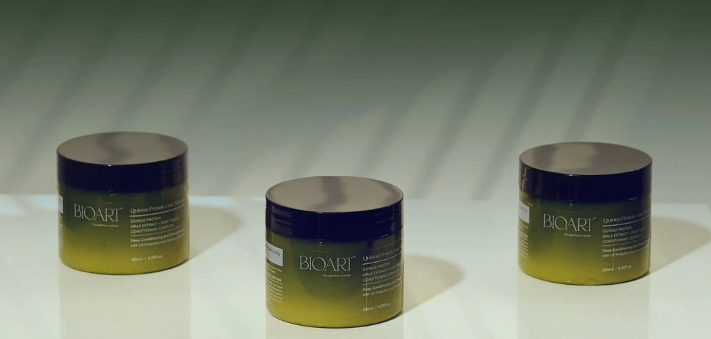 Three jars of Biorit cream on a reflective surface with a gradient background